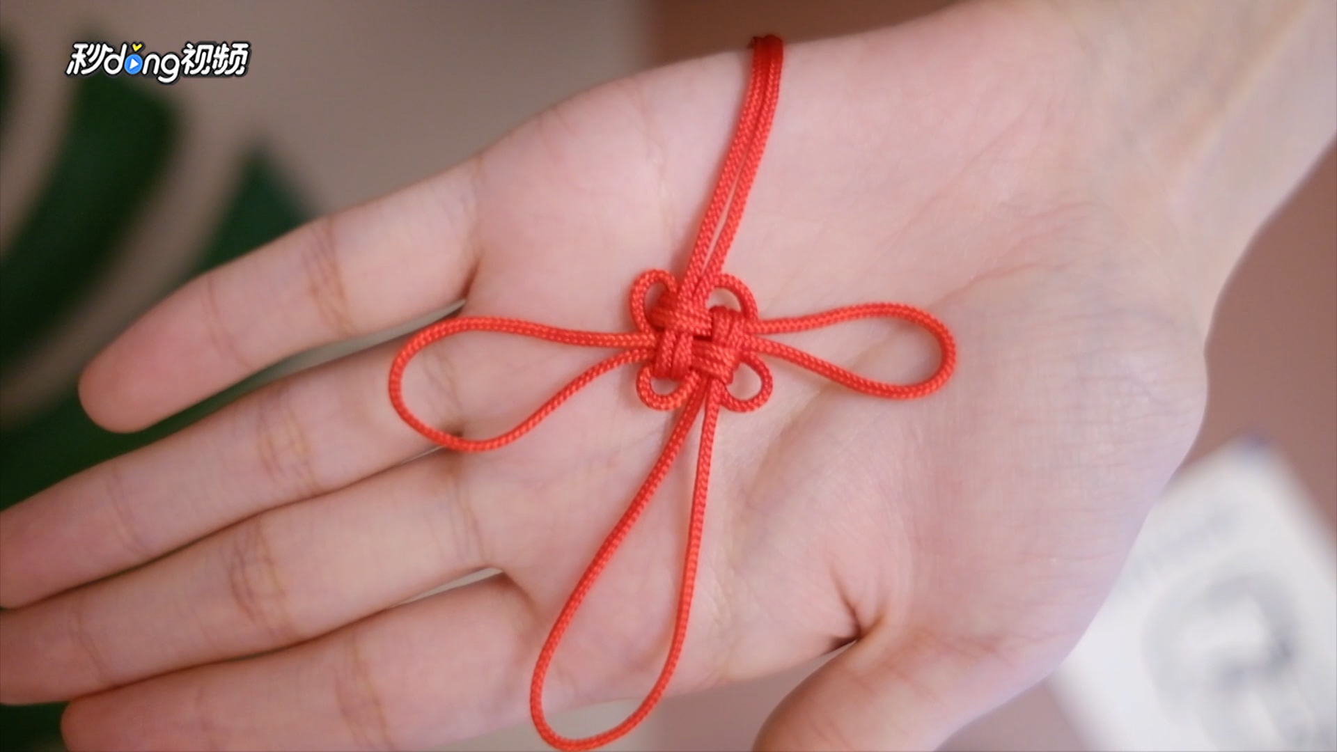 手串佛珠头上的中国结如何编