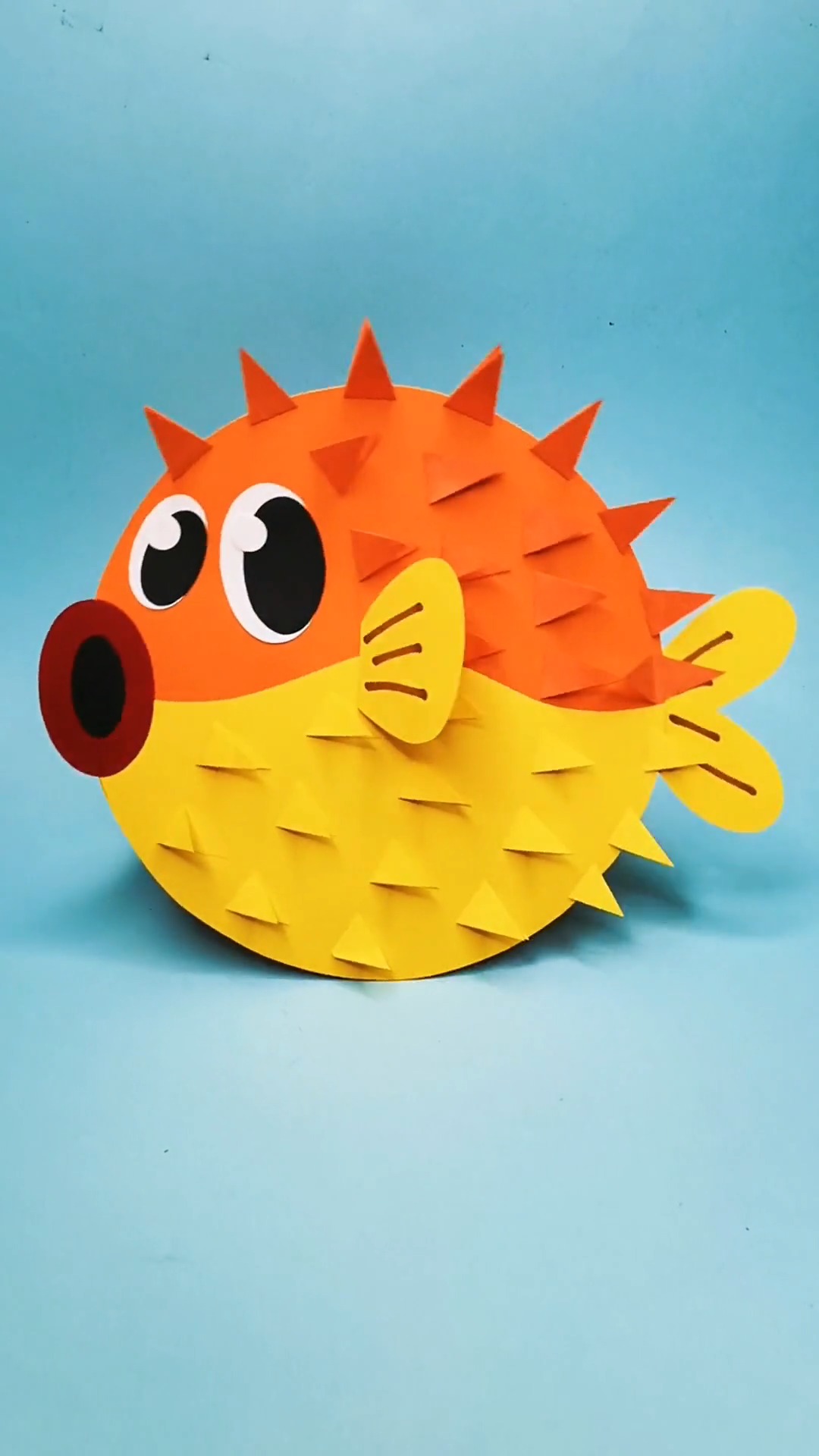 怎样做摇摆的小河豚手工?